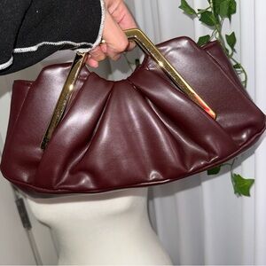Brand new burgundy clutch